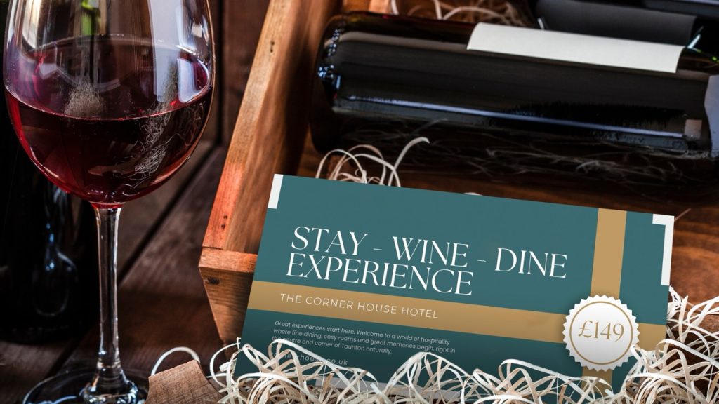 Corner house wine and dine voucher next to wine bottles
